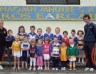 Ulster Council coaches Roisin Keenan and Eoghan Gribben pictured here with some of the kid s who attended Saffron Og Camp at St.Mary's Rasharkin